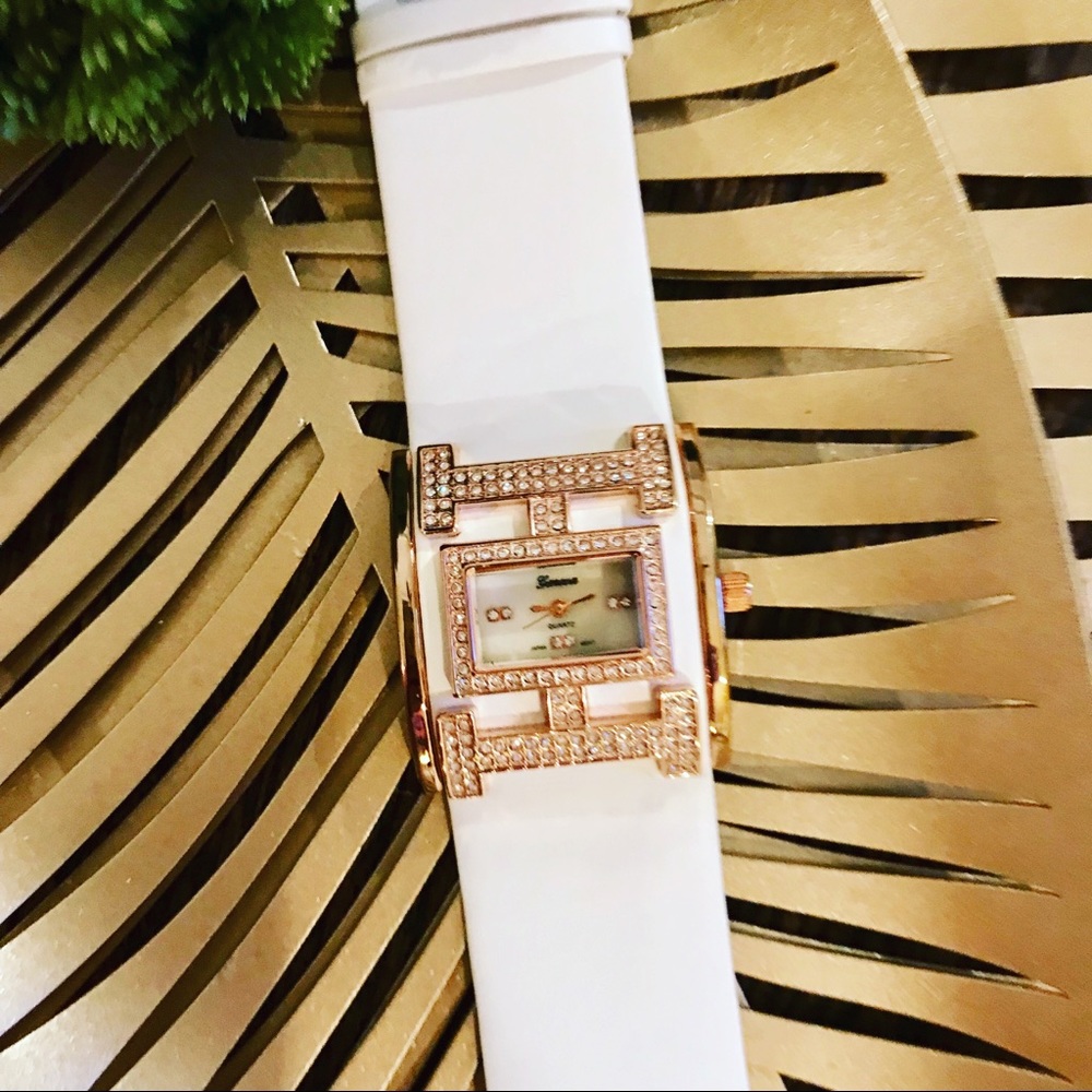 Batter operated Watch w/Rose-gold hardware.